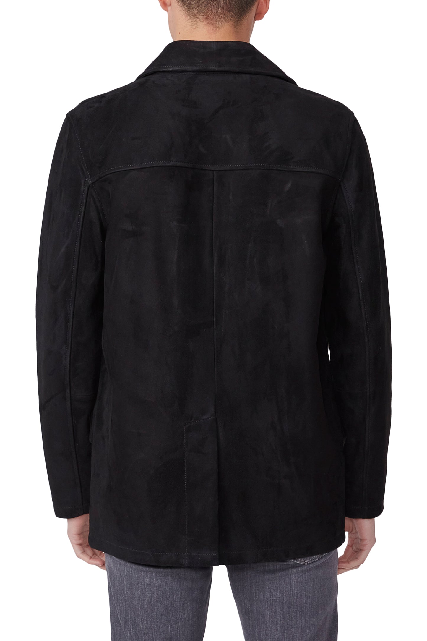 Black jacket worn by a person on a white background