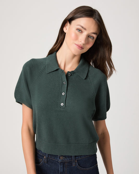 Model wearing green short sleeve sweater top