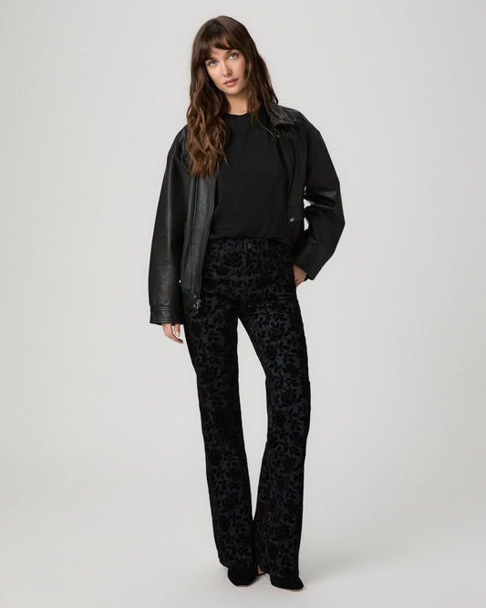 Sofia Flare Jean in black floral flock denim styled with a black leather jacket