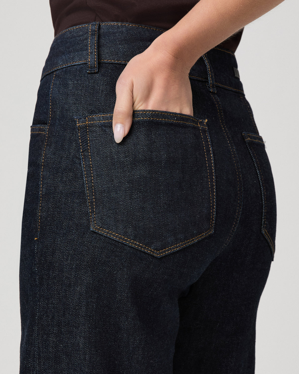 Detail of the back pocket and contrast stitching on the Sasha Wide Leg Jean in Times dark wash