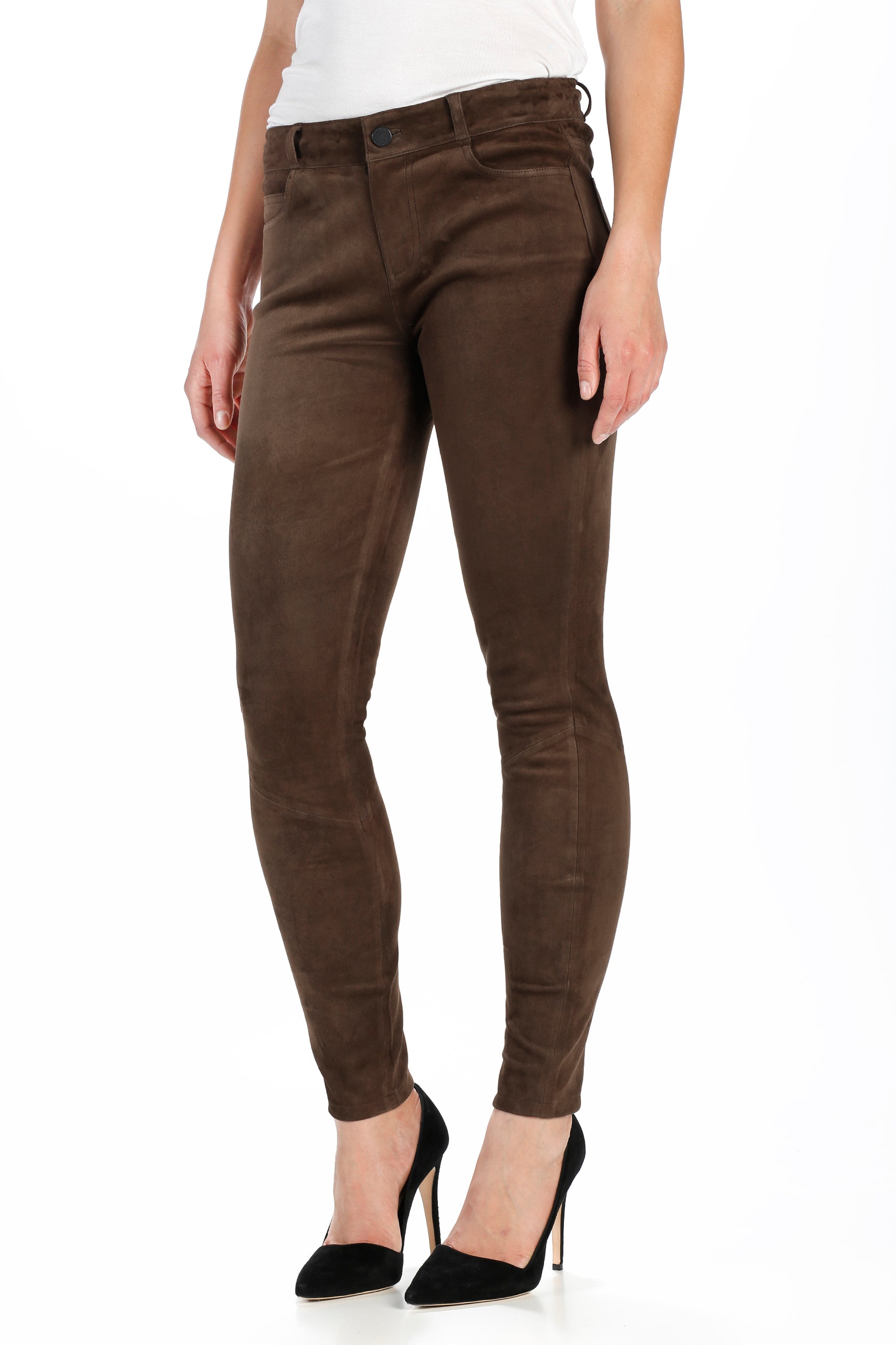 Brown pants worn by a person on a white background
