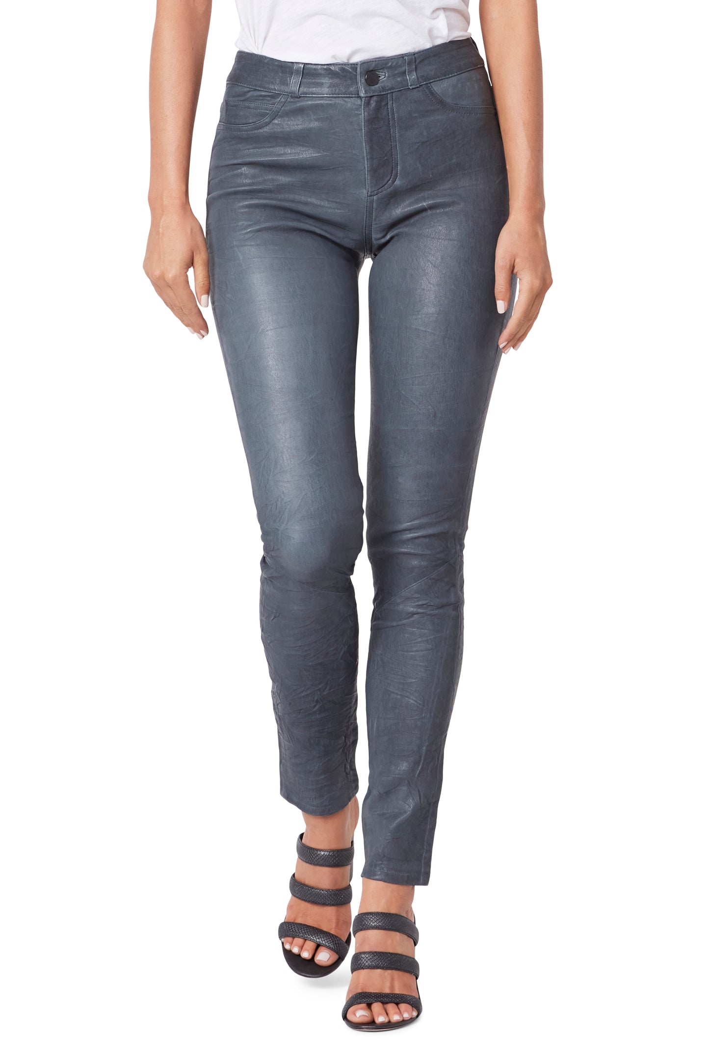 Person wearing gray jeans on a white background