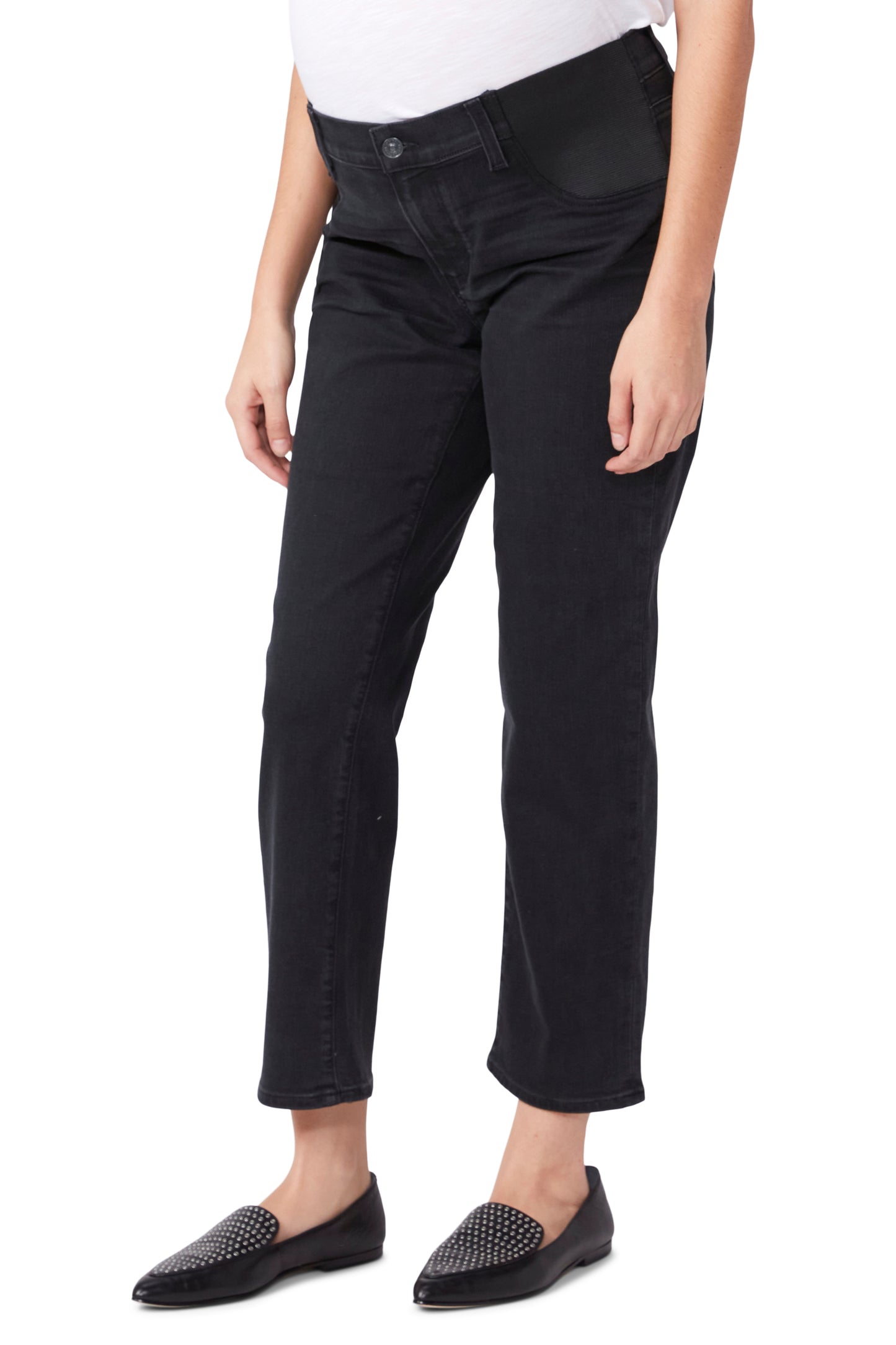 Person wearing black pants on a white background
