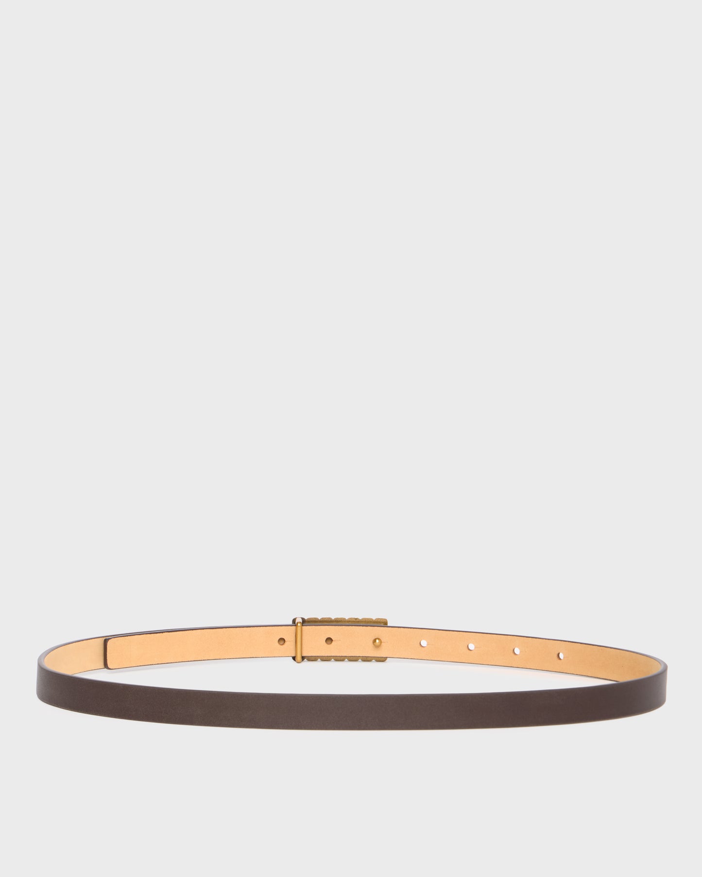 A slim brown leather belt with a gold-tone buckle and matching gold-tone inner lining, displayed horizontally against a light gray background.