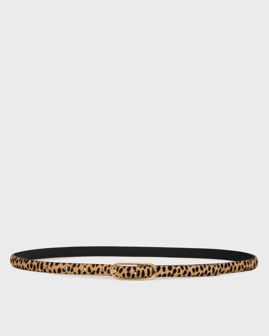A slim leopard-print belt with a black interior lining and a gold-tone oval buckle, displayed horizontally against a light gray background.