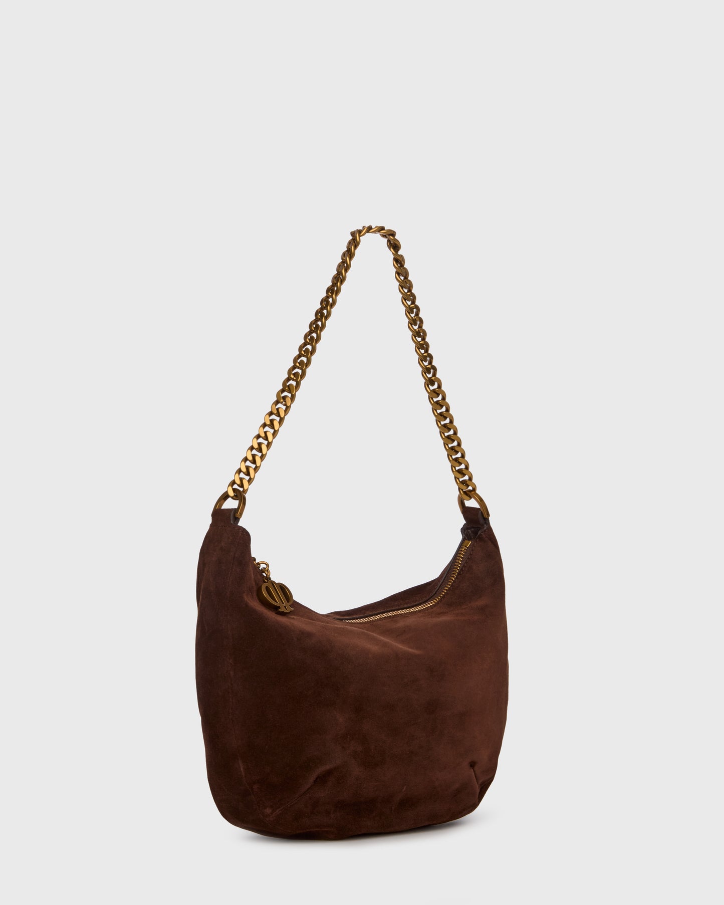 A dark brown suede hobo shoulder bag with a gold-tone chain strap, shown against a light gray background.