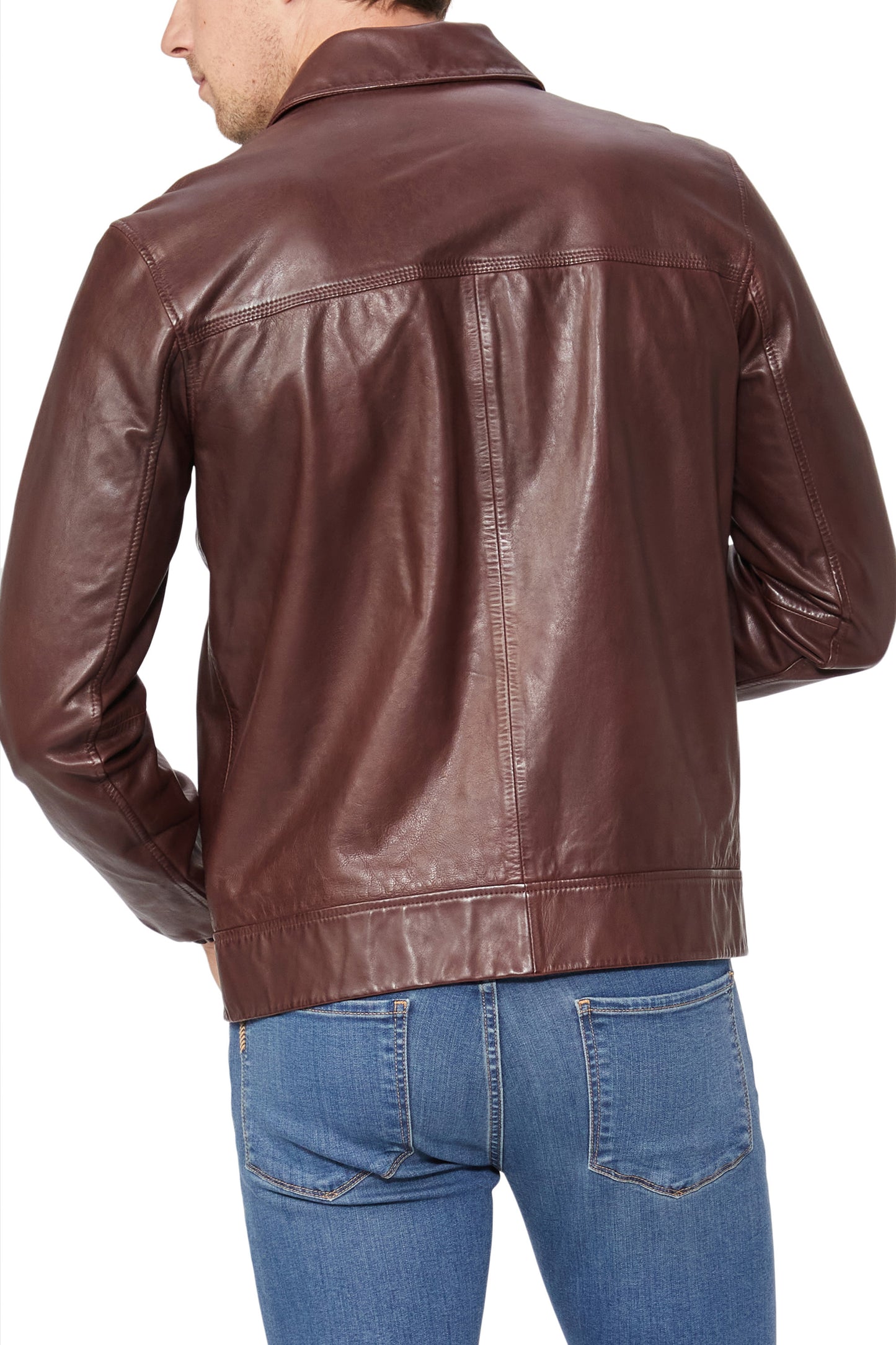 Brown leather jacket worn by a person on a white background