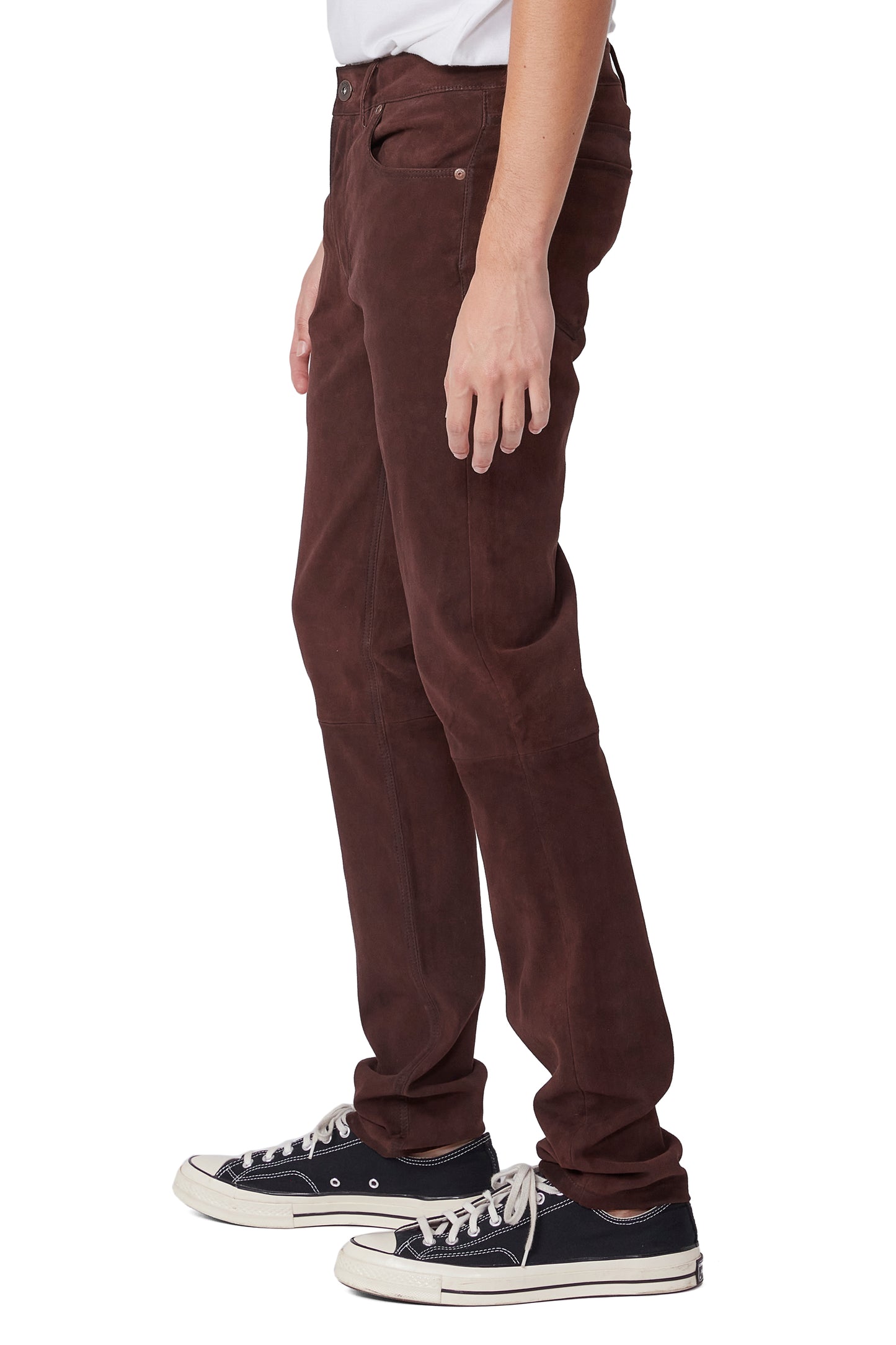 Brown pants worn by a person on a white background