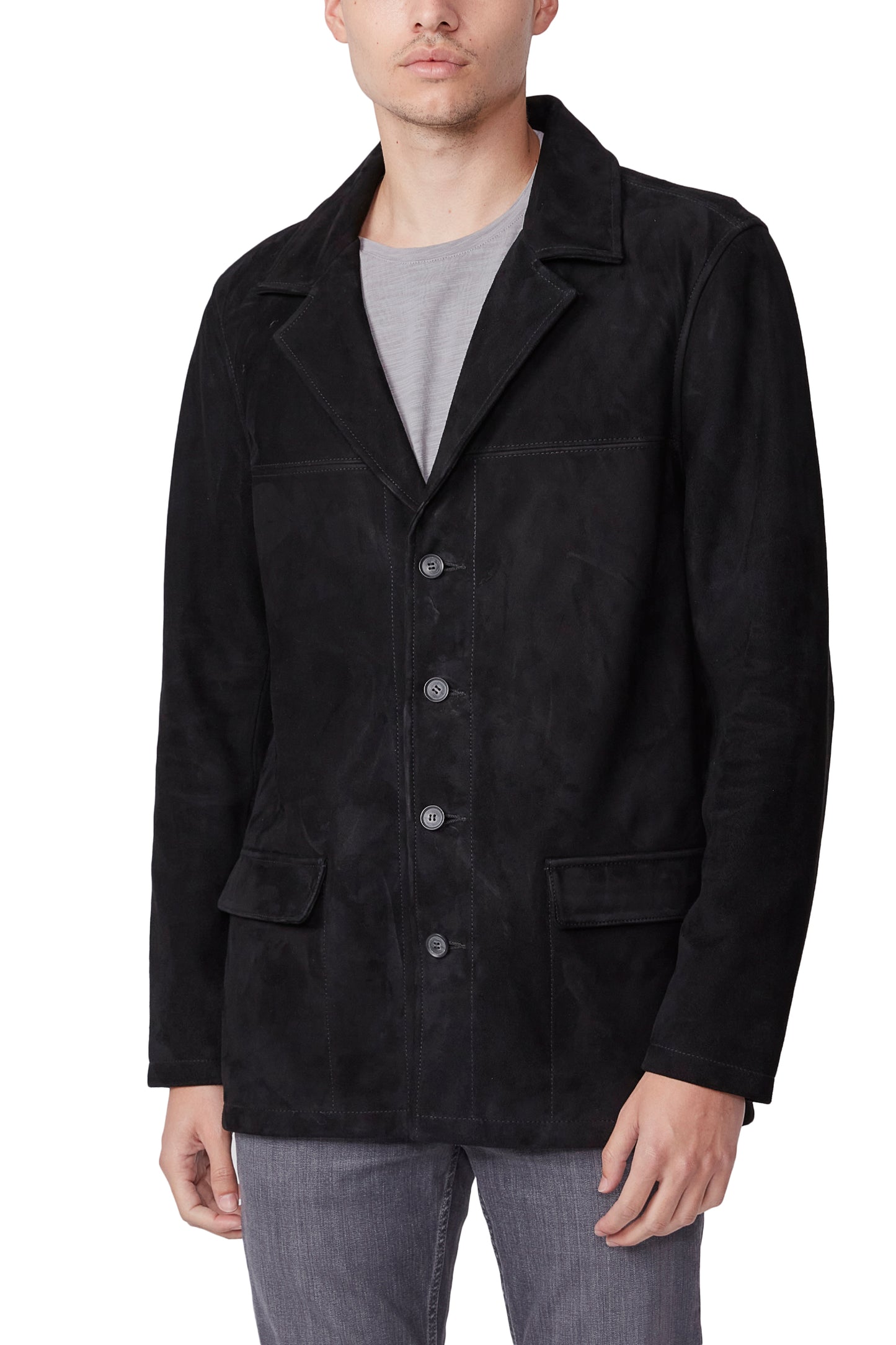 Black jacket worn by a person on a white background