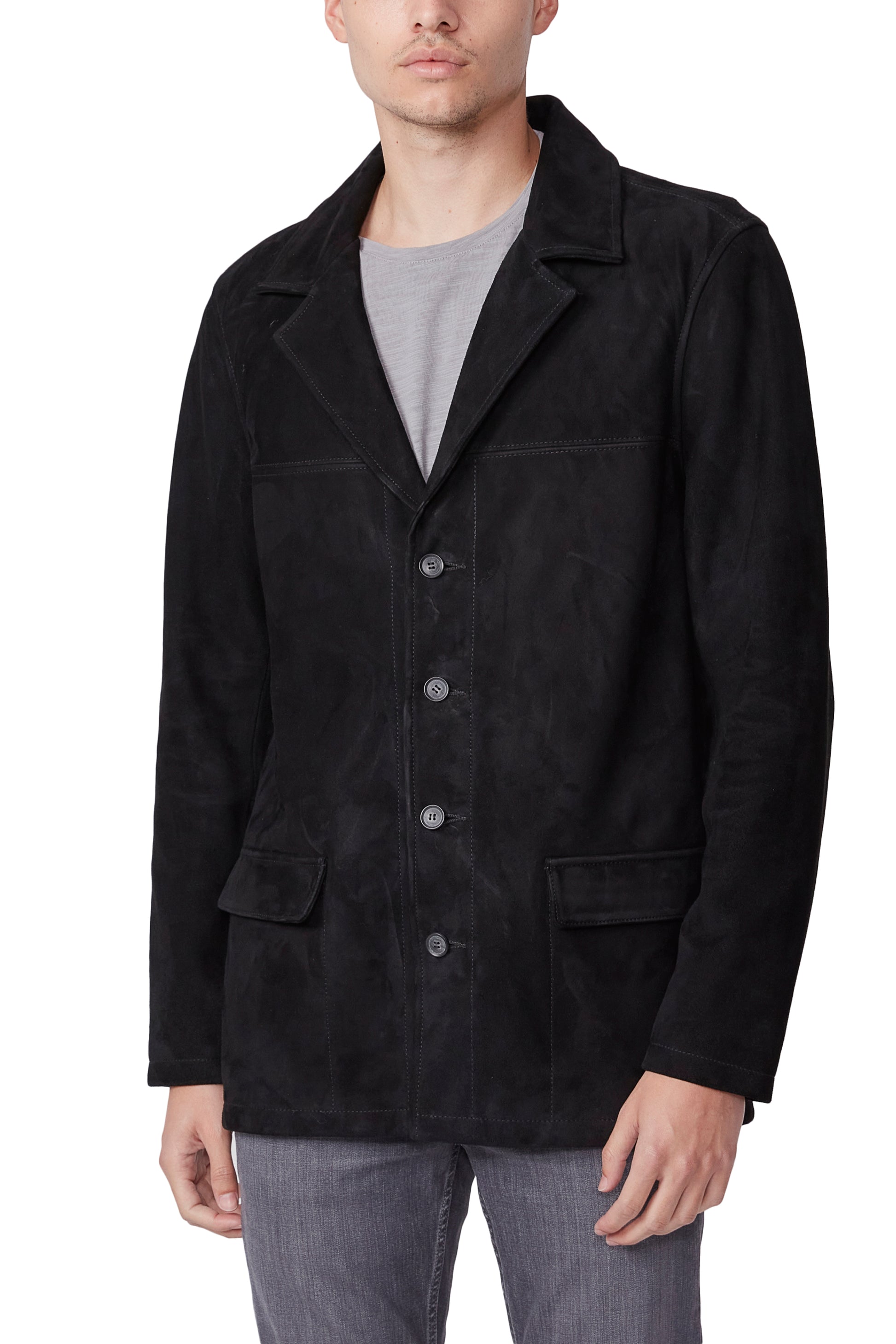Black jacket worn by a person on a white background
